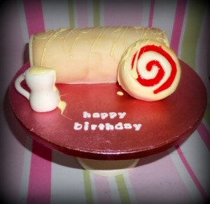 Swiss roll and custard birthday cake