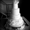 4 tier wedding cake with lace and flowers