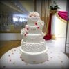4-tier-wedding-cake-with-roses-and-piping